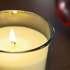 Bougie parfumée dans verre, fleur de citronnier jaune clair