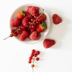 Bougie parfumée dans verre, fruits rouges rose clair